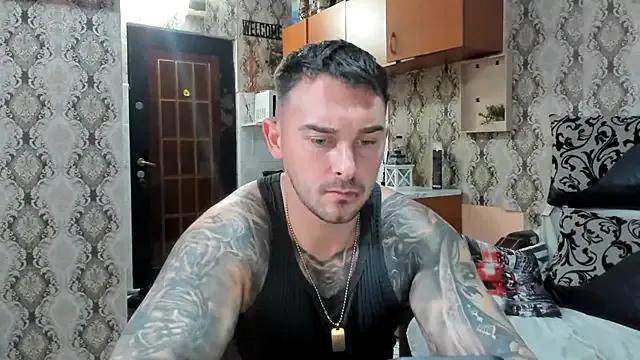 StripChat Jonmusclemaster  is Freechat  Jonmusclemaster — t-shirt off and hard cock
